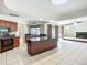 Modern kitchen boasts granite countertops, stainless appliances, and an open design at 1623 Carter Oaks Dr, Valrico, FL 33596