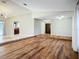 Open-concept living space with tile flooring, seamless transitions, and natural light at 1623 Carter Oaks Dr, Valrico, FL 33596