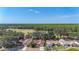 Beautiful homes in a serene neighborhood backing onto a lush green field with mature trees at 1623 Carter Oaks Dr, Valrico, FL 33596