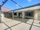 Large covered patio leading to a backyard swimming pool at 1623 Carter Oaks Dr, Valrico, FL 33596