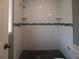 Bathroom showing the subway tile shower with a sleek and stylish design and black tile flooring at 1716 11Th N Ave, St Petersburg, FL 33713