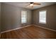 This bedroom features wood floors and great natural light from the two bright windows at 1716 11Th N Ave, St Petersburg, FL 33713