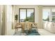 Inviting dining area with a wooden table, chairs, and sliding glass doors at 18468 Serene Lake Loop, Lutz, FL 33548