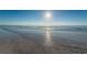 Relax on this pristine sandy beach with calm waters, perfect for swimming and sunbathing at 19111 Vista Bay Dr # 603, Indian Shores, FL 33785
