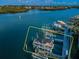 Aerial view of a private dock with boat lift, offering waterfront access at 19111 Vista Bay Dr # 603, Indian Shores, FL 33785