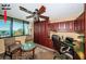 Home office with built-in desk and cabinets, murphy bed, and view of the Gulf of Mexico at 19111 Vista Bay Dr # 603, Indian Shores, FL 33785