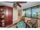 Bright living room with scenic views, built-in cabinets, and comfortable seating area at 19111 Vista Bay Dr # 603, Indian Shores, FL 33785