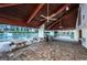 The covered pool pavilion features picnic tables and a grill, perfect for outdoor gatherings at 19111 Vista Bay Dr # 603, Indian Shores, FL 33785