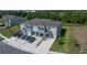 Exterior showcasing townhomes, driveways, and landscaping at 1926 Pleasant Maple Ct, Bradenton, FL 34211