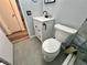 Charming bathroom featuring tile flooring, toilet and a vanity with black hardware at 2020 World Parkway Blvd # 14, Clearwater, FL 33763