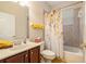 Well-maintained bathroom with shower-tub combo, tile surround, and vanity at 20251 Ravens End Dr, Tampa, FL 33647