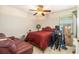 Cozy bedroom with a ceiling fan and natural light at 20251 Ravens End Dr, Tampa, FL 33647