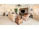Cozy living room with neutral carpet, ceiling fan and comfortable seating arrangement, perfect for relaxation at 20251 Ravens End Dr, Tampa, FL 33647