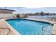 Sparkling in-ground pool with waterfront views and a deck, creating an ideal outdoor oasis at 2140 Dolphin S Blvd, St Petersburg, FL 33707