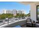 Enjoy the outdoors on this balcony with comfortable seating and beautiful skyline views at 231 2Nd S St # 201, Safety Harbor, FL 34695
