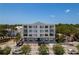 Four-story condo building offering balconies, convenient parking, and a prime location near local amenities at 231 2Nd S St # 201, Safety Harbor, FL 34695