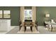 Contemporary dining area with wooden table, black chairs, and neutral color scheme at 2726 Bryce Ravine Ave, Plant City, FL 33563