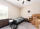 Cozy bedroom features neutral walls, a compact bed, and functional furniture at 311 Vista Cruiser Ln, Oldsmar, FL 34677