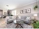 Inviting living room featuring comfortable seating, elegant decor, and an open layout at 311 Vista Cruiser Ln, Oldsmar, FL 34677