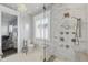 Contemporary bathroom showcasing a luxury shower with marble tile and a glass door at 3111 W De Leon St # 8, Tampa, FL 33609