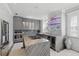 Modern kitchen features gray cabinets, stainless steel appliances, and granite countertops, highlighted by a wine cooler at 3111 W De Leon St # 8, Tampa, FL 33609