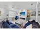 Inviting living room features a fireplace, TV, and comfortable blue seating at 3111 W De Leon St # 8, Tampa, FL 33609