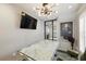 Stylish office space with custom desk, modern lighting fixture, and large wall art at 3111 W De Leon St # 8, Tampa, FL 33609