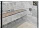 The shower features a built in bench and mosaic tile flooring at 3111 W De Leon St # 8, Tampa, FL 33609