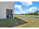 Backyard view includes a lake at 33030 Major Oak Dr, Wesley Chapel, FL 33545