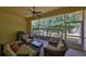 Screened in patio for relaxation and comfort with ample views of the outdoor space at 3315 Granite Ridge Loop, Land O Lakes, FL 34638