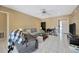 Comfortable living room with tile flooring, a ceiling fan, and neutral-colored walls at 3414 Rankin Dr, New Port Richey, FL 34655