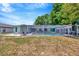 Enclosed pool with screened-in enclosure, providing a private and relaxing outdoor space at 3414 Rankin Dr, New Port Richey, FL 34655
