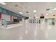 Spacious community room with stage, ceiling fans, and ample space for gatherings and events at 34506 Rose N Dr, Pinellas Park, FL 33781