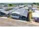 Charming manufactured home with carport and well-maintained landscaping in a quiet community at 34506 Rose N Dr, Pinellas Park, FL 33781