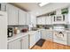 Bright kitchen with sleek countertops, modern appliances, and ample cabinet space at 34506 Rose N Dr, Pinellas Park, FL 33781