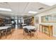Inviting library space with bookshelves, tables, and comfortable seating perfect for reading and relaxation at 34506 Rose N Dr, Pinellas Park, FL 33781