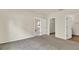 Bedroom features neutral walls, carpet flooring and multiple doors, enhancing functionality and spaciousness at 3503 Diamond Leaf Ct, Valrico, FL 33594