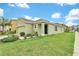 Charming single Gathering home featuring a two-car garage and well-maintained front lawn at 3503 Diamond Leaf Ct, Valrico, FL 33594