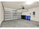 A spacious garage with a roll-up door provides ample parking and storage at 3503 Diamond Leaf Ct, Valrico, FL 33594