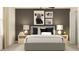 Stylishly decorated bedroom with a comfortable bed, bedside tables, and modern decor at 3711 Forest Path Dr, Plant City, FL 33565