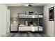 Stylish bunk bed bedroom with modern decor, geometric rug, and a cozy atmosphere at 3711 Forest Path Dr, Plant City, FL 33565