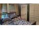 Cozy bedroom with natural light and comfortable furnishings at 4303 N 10Th St, Tampa, FL 33603