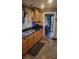 Charming kitchen featuring stainless steel appliances and a unique tile floor at 4303 N 10Th St, Tampa, FL 33603