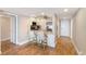 Kitchen with granite countertops, stainless steel appliances and breakfast bar seating at 433 Mariner Dr # 433, Tarpon Springs, FL 34689
