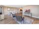 Cozy living room with seating area, ocean views, and adjacent dining area and kitchen at 433 Mariner Dr # 433, Tarpon Springs, FL 34689