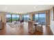 Bright living room with water views and lots of natural light from sliding glass doors at 433 Mariner Dr # 433, Tarpon Springs, FL 34689