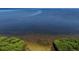 Beautiful water view highlighting the lush greenery and blue waters of this community at 433 Mariner Dr # 433, Tarpon Springs, FL 34689