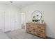 Bright bedroom featuring a dresser with decor and art at 4587 Georgia Ave, North Port, FL 34288