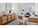 Well-lit home office with contemporary furniture, desk, and stylish decor at 4587 Georgia Ave, North Port, FL 34288