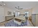Large bedroom featuring a comfortable bed, furniture, and ample natural light at 4910 W Mcelroy Ave # 6, Tampa, FL 33611